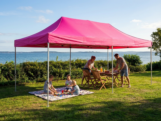 Pink pop-up gazebo with steel frame set up in an outdoor setting - product detail