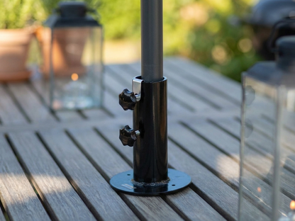 Black powder coated steel parasol base for terrace use