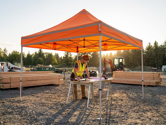 Orange pop-up gazebo with steel frame for outdoor events