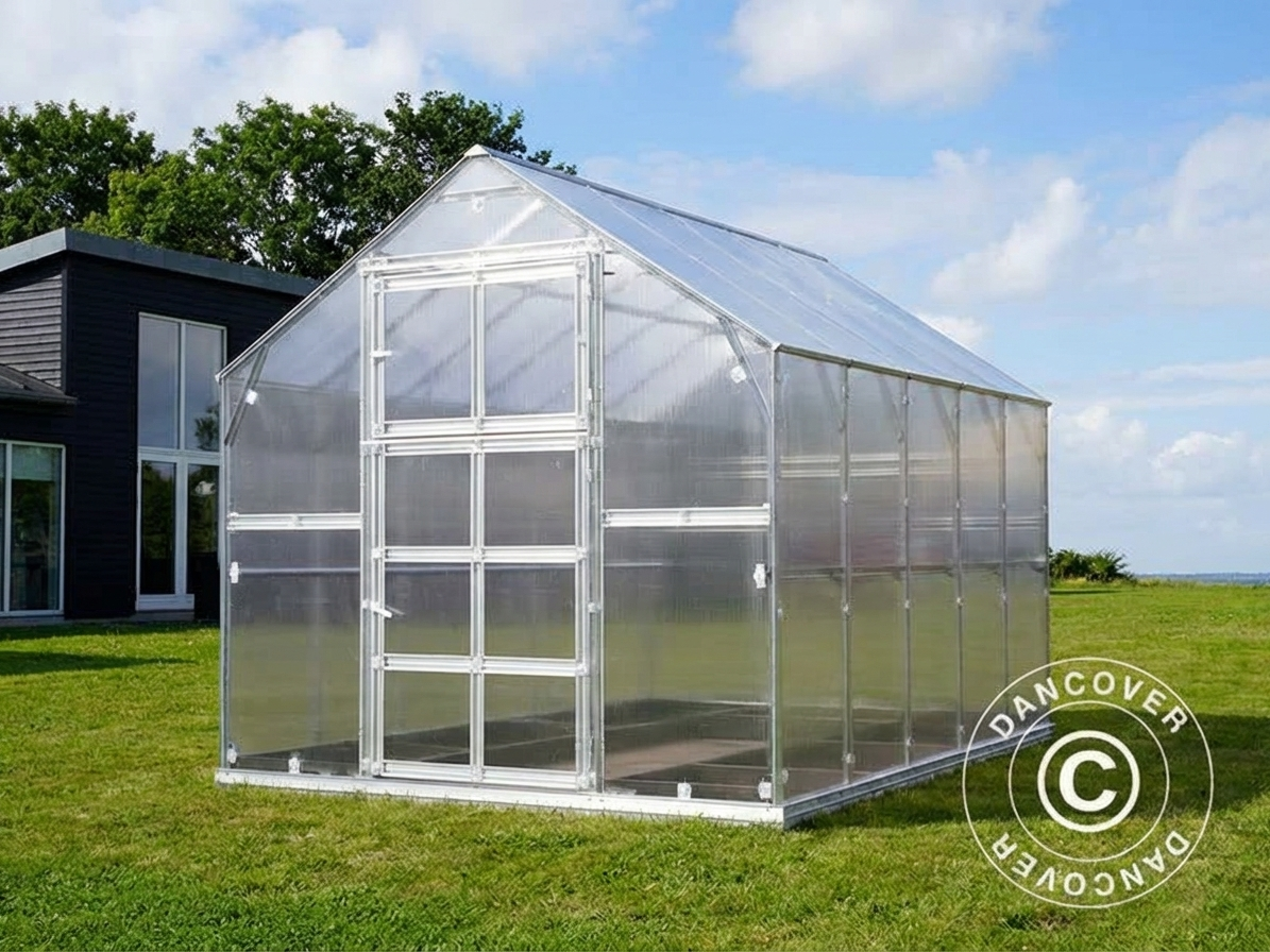 Silver greenhouse with polycarbonate panels and steel frame for outdoor use