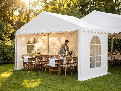 White PVC tent extension with galvanised steel frame for outdoor events
