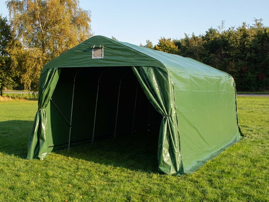 Portable garage in green PVC with steel frame for outdoor storage
