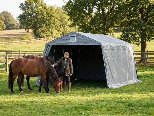 Grey livestock shelter made from PVC and galvanised steel