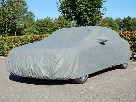 Grey car cover providing outdoor protection