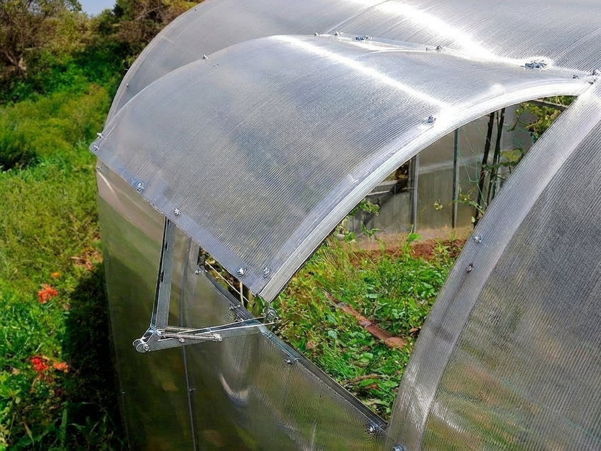 Silver ventilation window with automatic opener for greenhouses