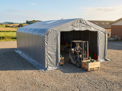 Grey PVC storage shelter measuring 6x12x3.7 m for industrial use - product detail