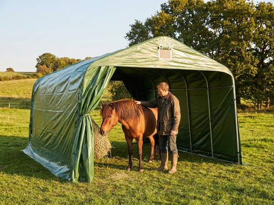 Green PVC livestock shelter with galvanised steel frame, perfect for outdoor protection - product detail