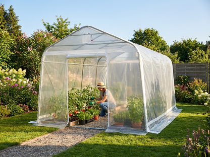 Transparent polytunnel greenhouse with galvanised steel frame