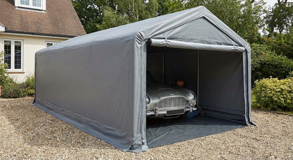 Portable grey PVC garage for outdoor storage