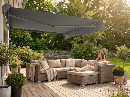 Remote controlled awning in grey with aluminium frame for outdoor use