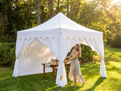 White and gold pop-up gazebo with steel frame for outdoor events