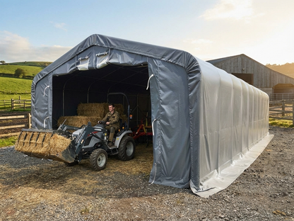 Grey PVC storage shelter measuring 6x12x3.7 m for industrial use
