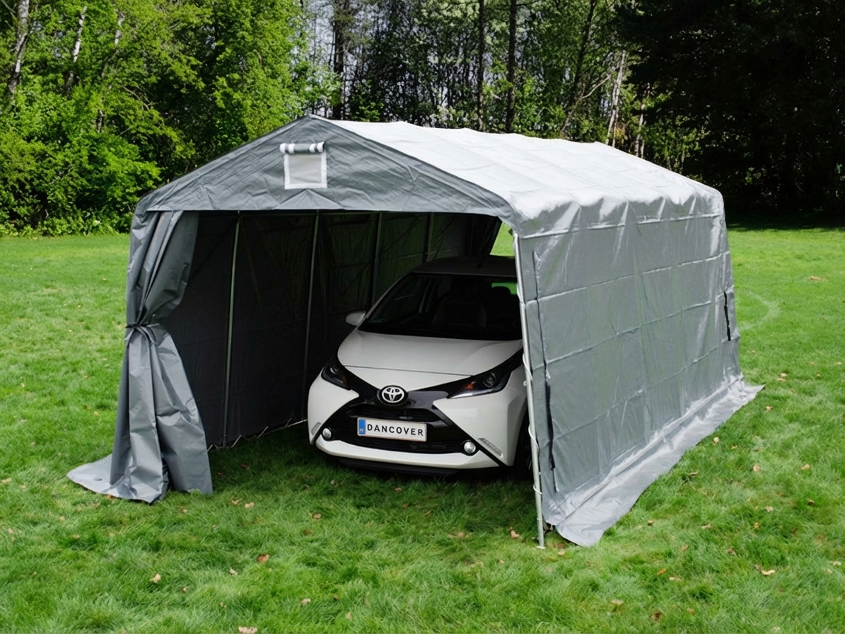 Grey portable garage made with PVC and steel for outdoor use